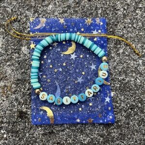 "SAGITTARIUS" Zodiac Alphabet Bracelet - 7 inches - Stretch Cord - Blue